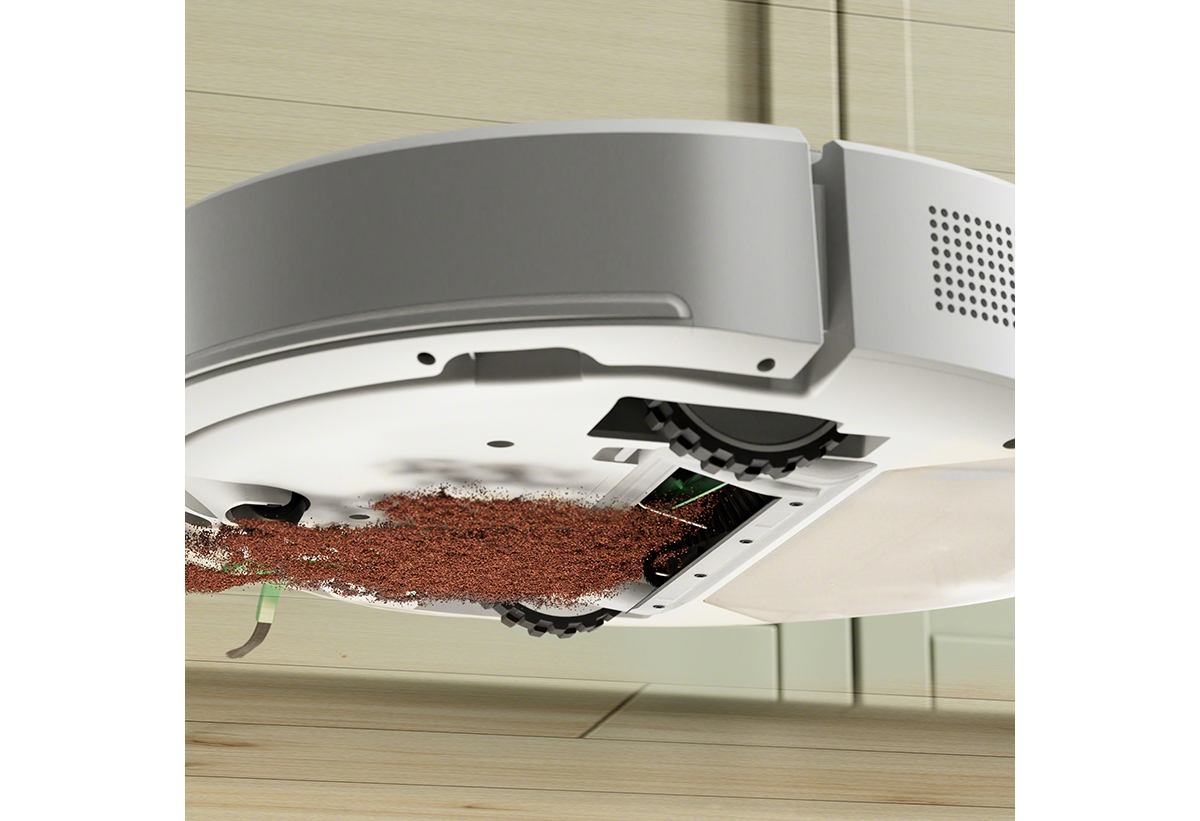 Φαίνεται η σκούπα να αποροφά σκόνη και βρωμίες από το πάτωμα.